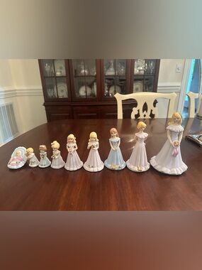 Enesco Porcelain Pastel Girl Figurine Collection in White, Pink, Blue. Set of 9